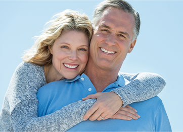 Photo of a couple smiling. Link to Life Stage Gift Planner Under Age 60 Situations.